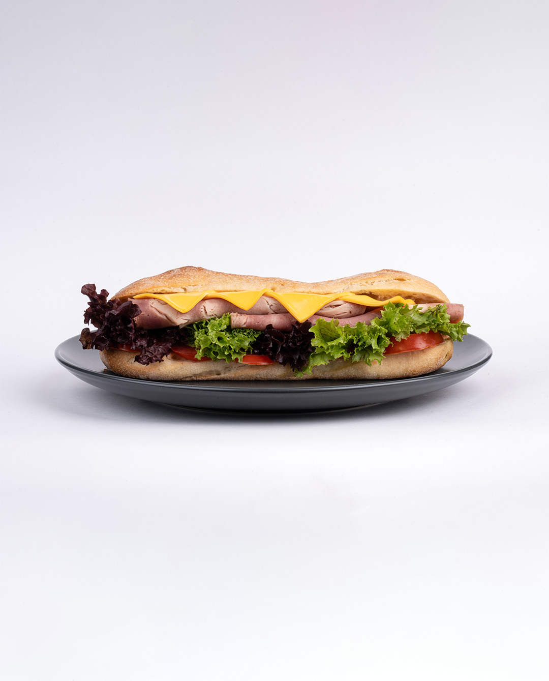 ساندویچ باگت مخلوط ژامبون گوشت و مرغ